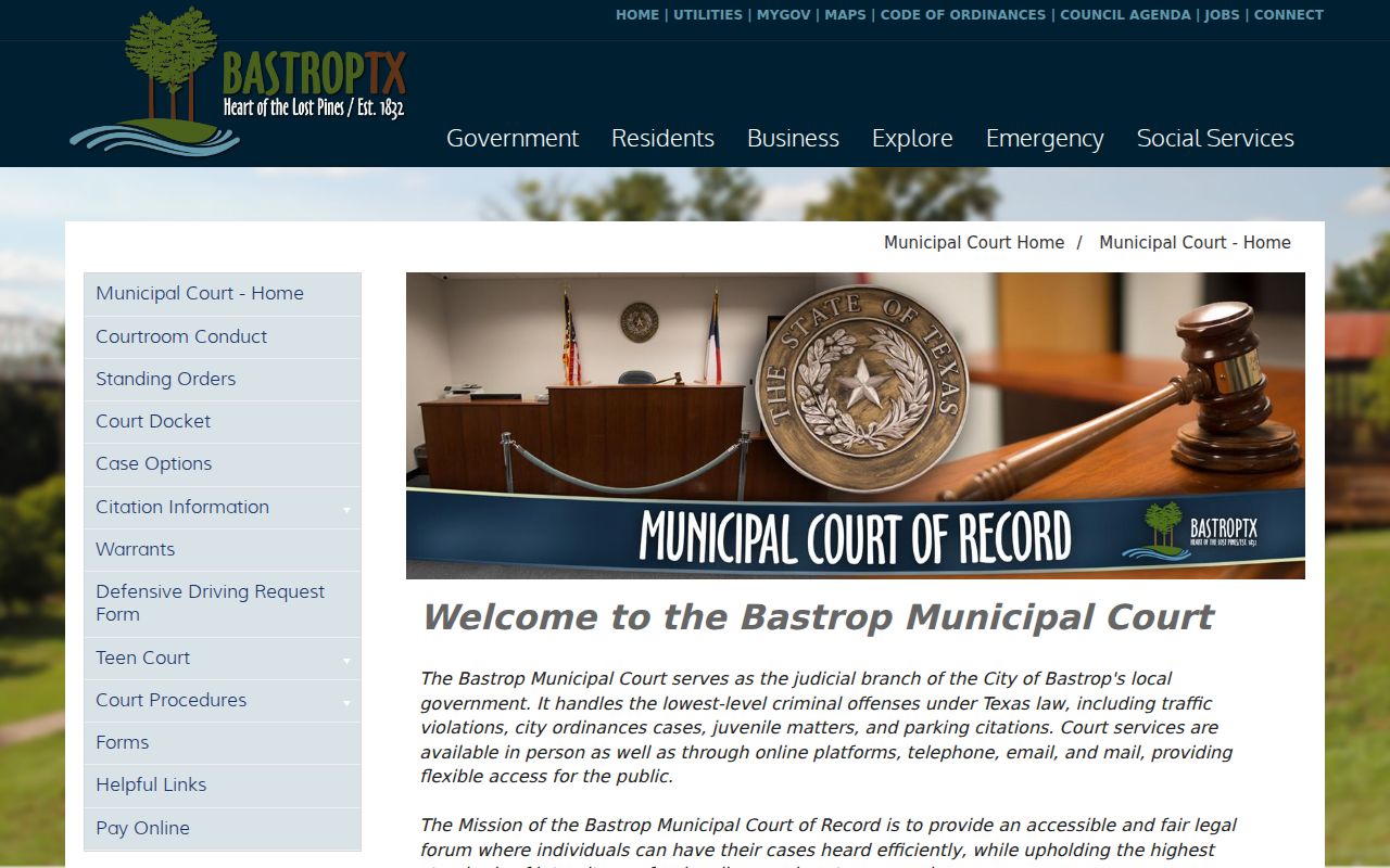 Bastrop County municipal warrant court building and public contact block